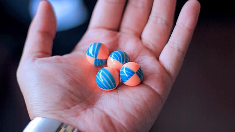 Man Holding Paintballs Man Holding Paintballs